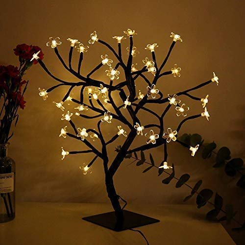 LED tree light with warm white bulbs on a dark square base