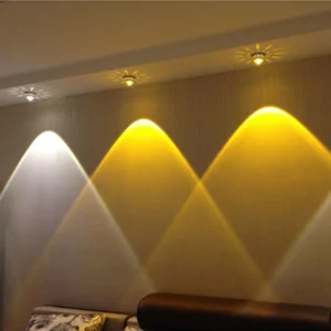 LED spotlights and downlights washing a wall with cool and warm light